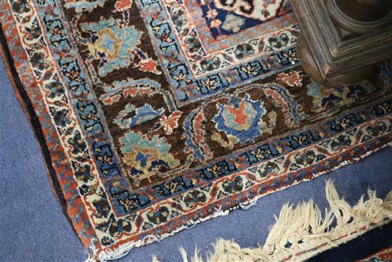 A Persian blue ground carpet 215cm x 155cm